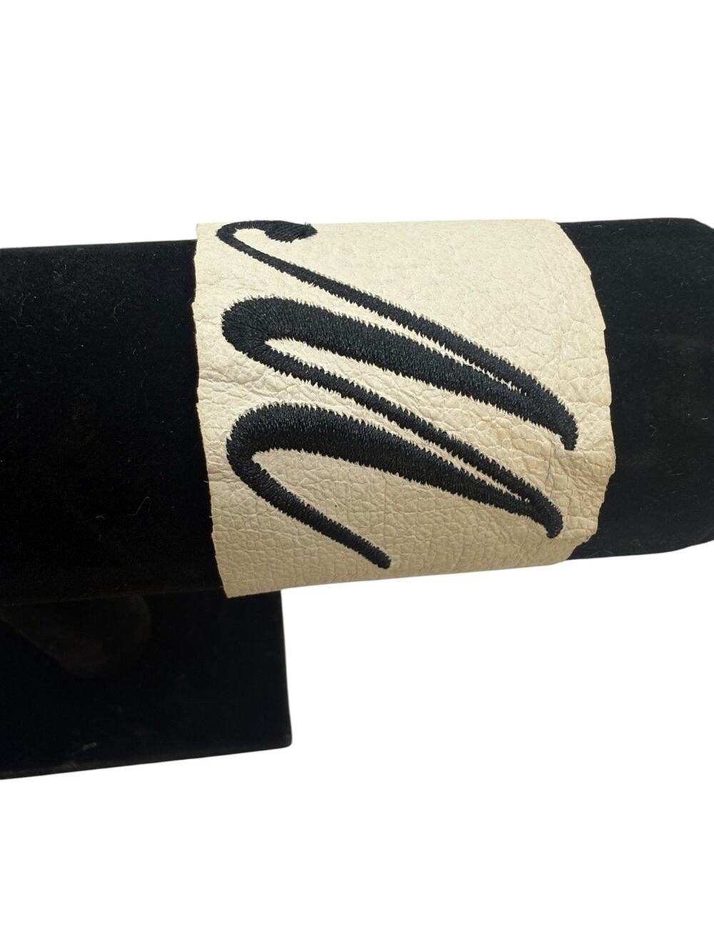 Monogram 'M' Wide Snap Cuff Bracelet in Cream with Black Lettering